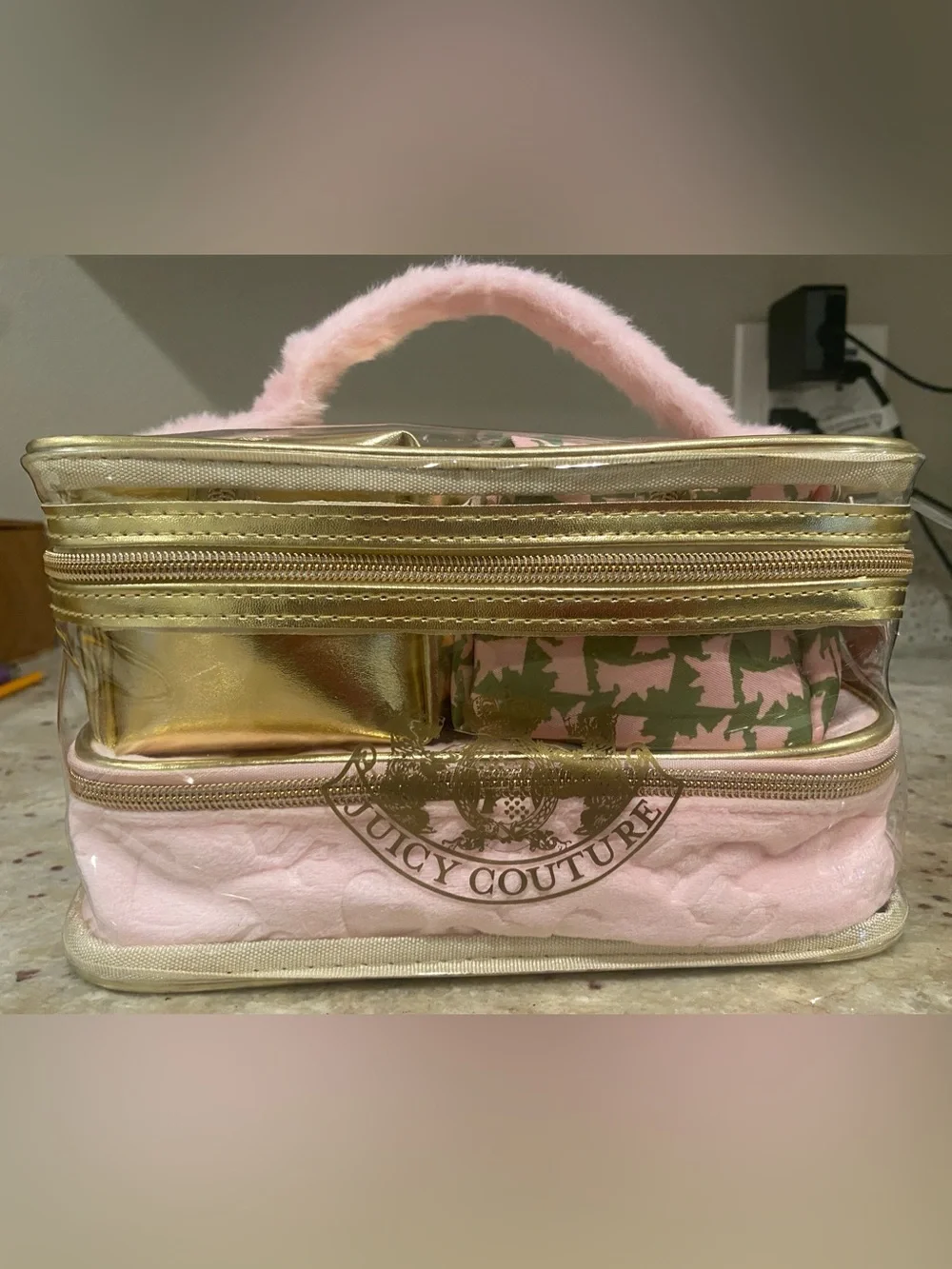 4 piece Juicy Couture Pink and Gold Quilted Cosmetic Carry Case.